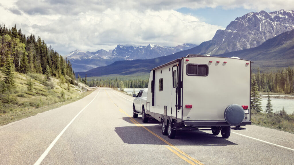 Caravan or motor home trailer on a mountain road